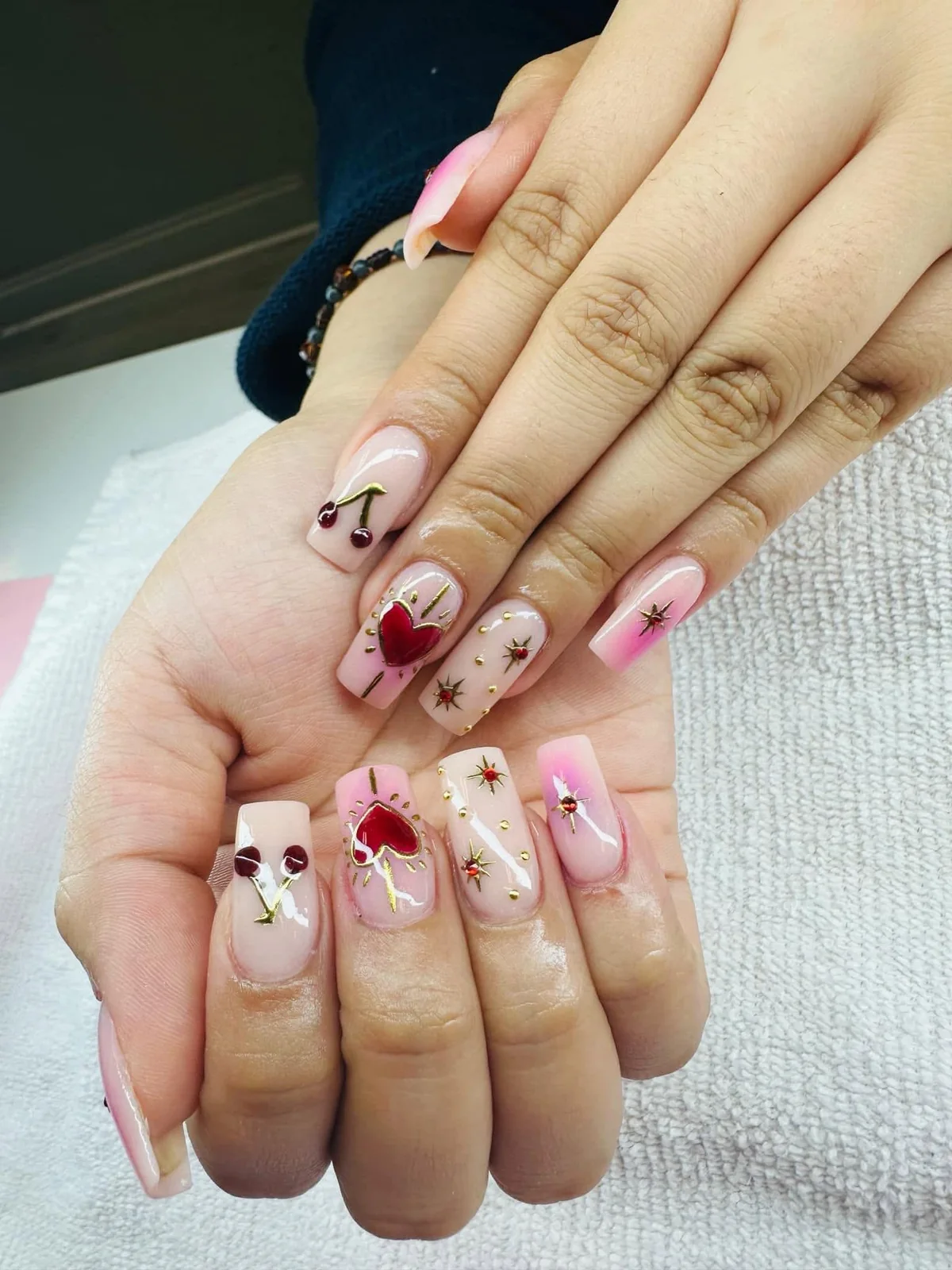Bright manicure with pink accents